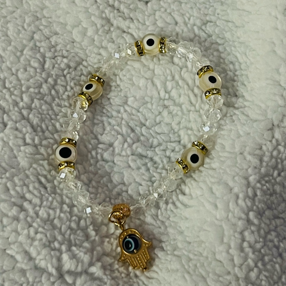 Stretchy 🧿 evil eye protection bracelet with hamsa charm